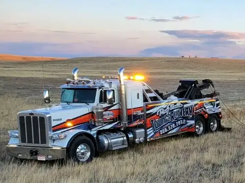Heavy-duty wrecker operating in open terrain