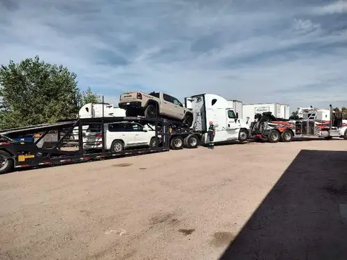 Heavy-duty tractors staged with commercial trailers